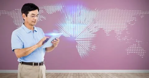 Composite image of man using digital tablet while standing Stock Photos