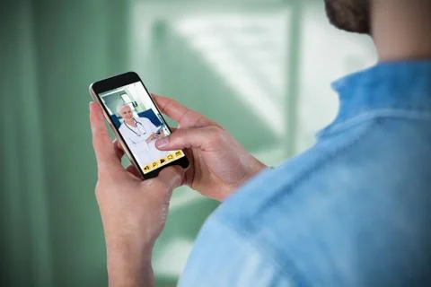 Composite image of man using mobile phone Stock Photos