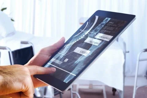 Composite image of man using tablet pc 写真素材