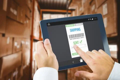 Composite image of man using tablet pc 스톡 사진