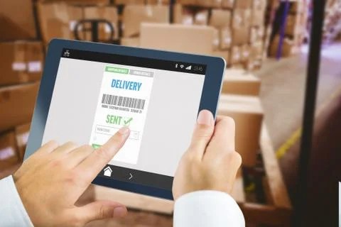 Composite image of man using tablet pc 스톡 사진