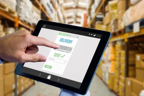 Composite image of man using tablet pc 스톡 사진