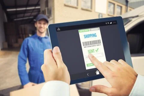 Composite image of man using tablet pc 스톡 사진