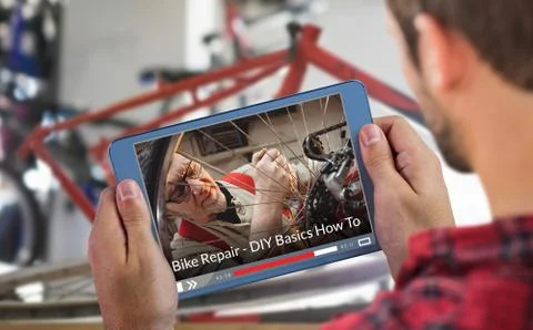 Composite image of man using tablet Stock Photos