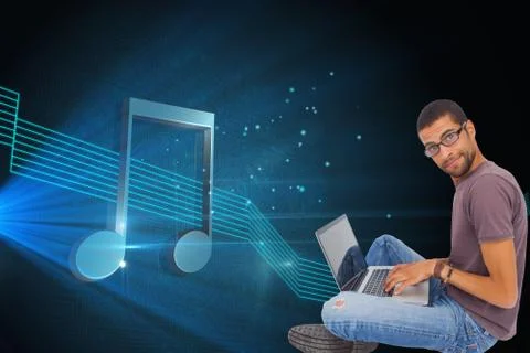 Composite image of man wearing glasses using laptop and looking at camera Illustrazione stock