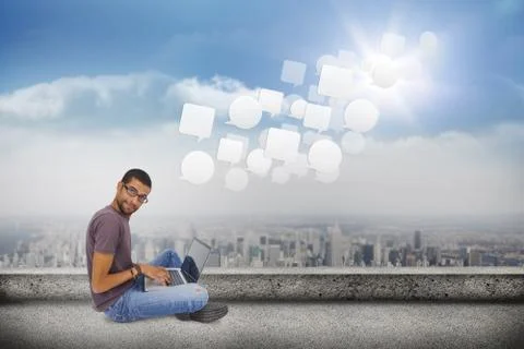 Composite image of man wearing glasses sitting on floor using laptop and looking Stock Illustration