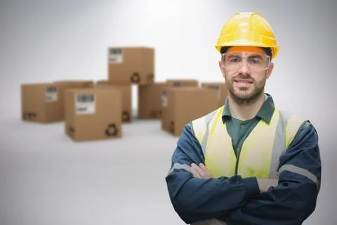 Composite image of manual worker wearing hardhat and eyewear Fotos de archivo