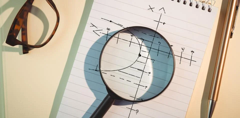 Composite image of maths pattern against black background Foto stock