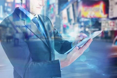 Composite image of mid section of a businessman using digital tablet Stock Illustration