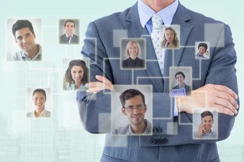 Composite image of midsection of businessman standing arms crossed 스톡 일러스트