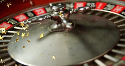 Composite image of multiple golden star icons falling against close up of Stock Photos