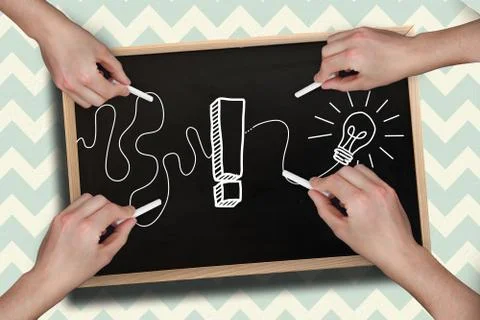 Composite image of multiple hands drawing exclamation mark with chalk Foto stock