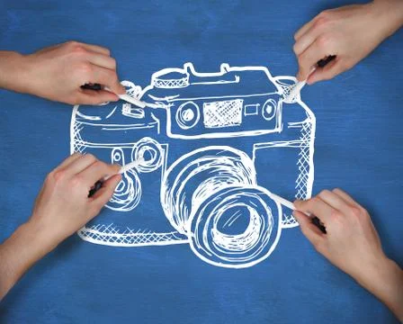 Composite image of multiple hands drawing camera with chalk Stock Photos