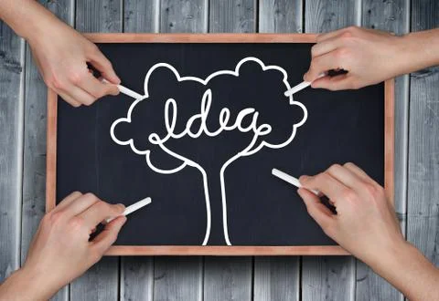 Composite image of multiple hands drawing idea tree with chalk Stock Photos