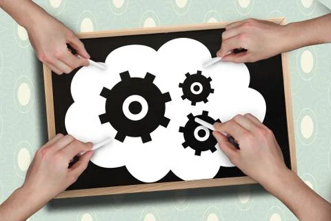 Composite image of multiple hands drawing cogs with chalk Stock Photos