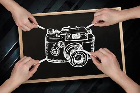 Composite image of multiple hands drawing camera with chalk Stock Photos