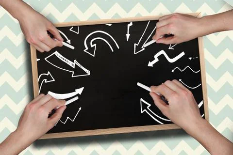 Composite image of multiple hands drawing arrows with chalk Stock Photos