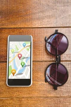 Composite image of navigation pointers with various representations on map Foto stock