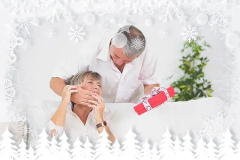 Composite image of old man hiding eyes his wife to give a gift Stock Illustration