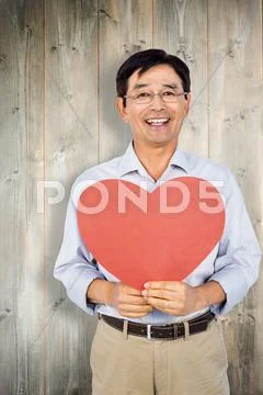 Composite Image Of Older Asian Man Showing Heart