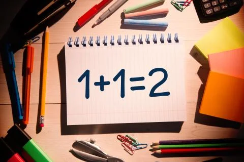 Composite image of one plus one equals two on notepad Illustrazione stock