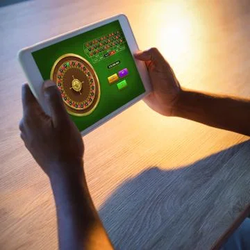 Composite image of online roulette game Stock Photos