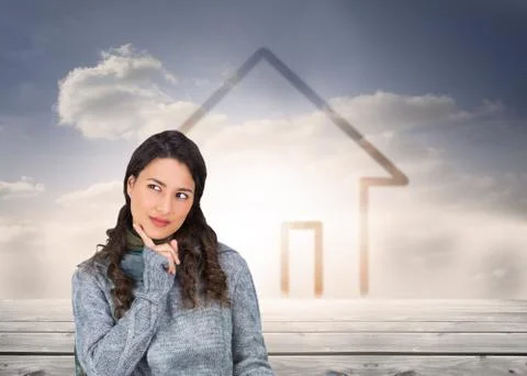 Composite image of pensive model wearing winter clothes holding her tablet Illustrazione stock