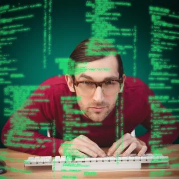 Composite image of portrait of concentrated man working on computer Stock Photos