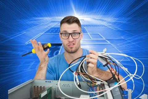 Composite image of portrait of confused it professional with screw driver and イラスト素材