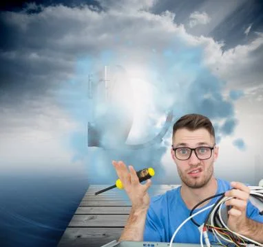 Composite image of portrait of confused it professional with screw driver and Stock Illustration