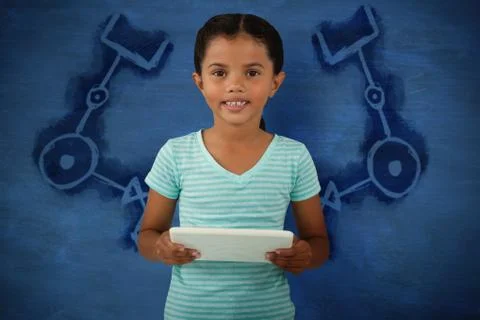 Composite image of portrait of cute smiling girl holding digital tablet 写真素材
