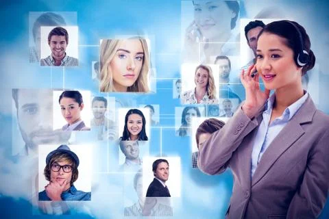 Composite image of portrait of a focused operator posing with a headset 写真素材