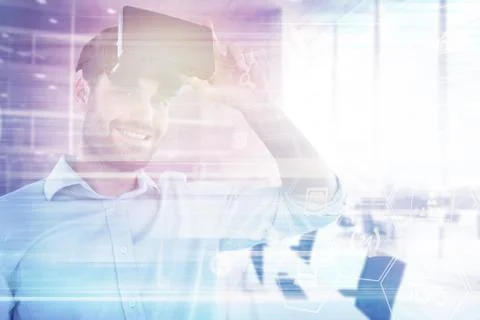 Composite image of portrait of man with virtual reality headset 3d Stockfoto's