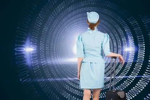 Composite image of pretty air hostess leaning on suitcase 写真素材