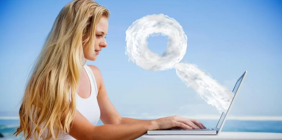 Composite image of pretty blonde using her laptop at the beach Stock Illustration