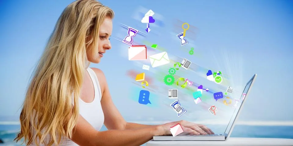 Composite image of pretty blonde using her laptop at the beach Stock Illustration