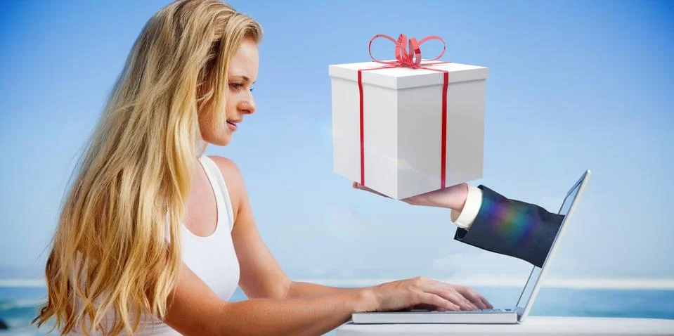 Composite image of pretty blonde using her laptop at the beach Stock Illustration