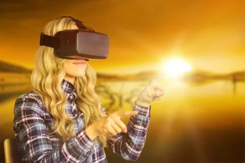 Composite image of pretty casual worker using oculus rift Stock Photos