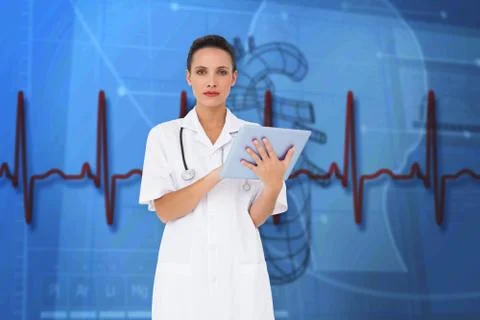 Composite image of pretty nurse using tablet pc 스톡 일러스트