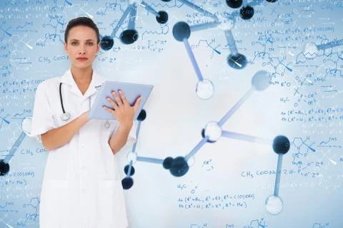 Composite image of pretty nurse using tablet pc 스톡 일러스트