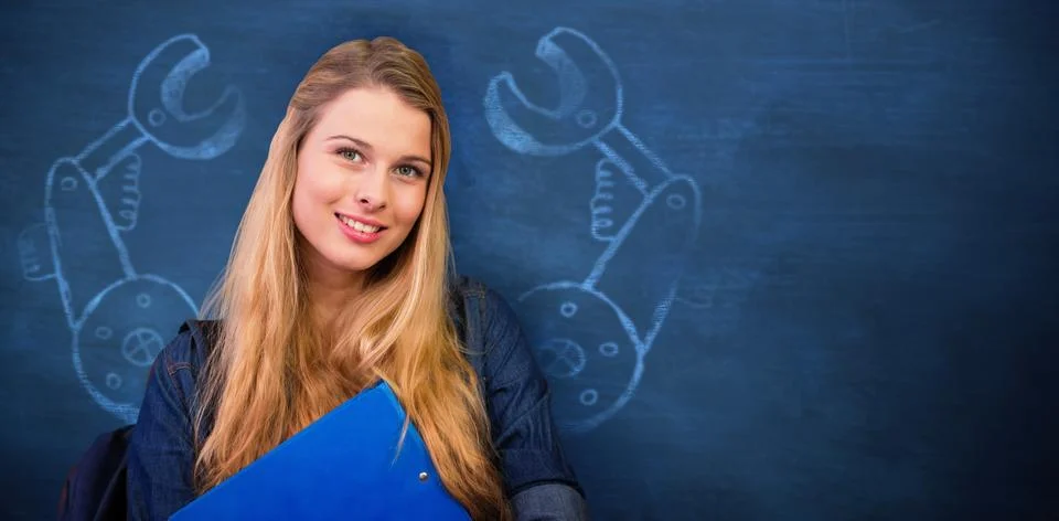 Composite image of pretty student in the library Stockfoto's