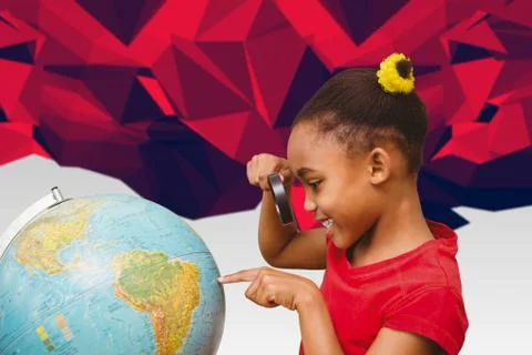 Composite image of pupil studying the globe Stock Photos