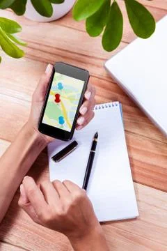 Composite image of red pointer surrounded by blue markers on world map Stock Photos