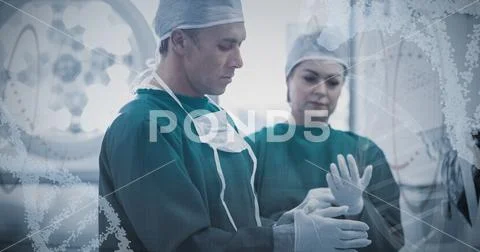 Composite image of red spiral dna pattern on screen Stock Photos