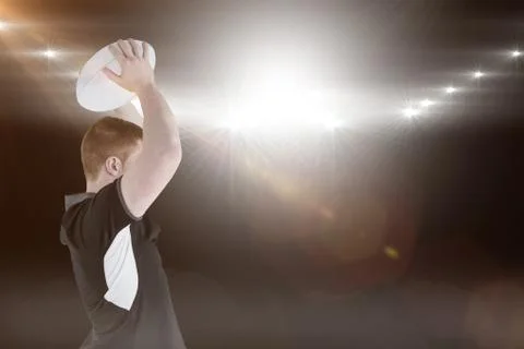 Composite image of rugby player about to throw a rugby ball 3D Stock Photos