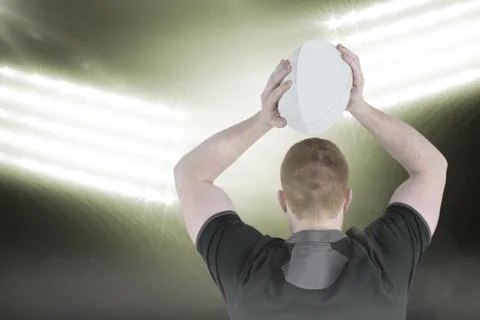 Composite image of rugby player about to throw a rugby ball 3D Stock Photos