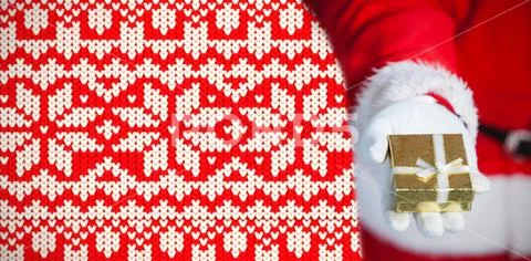 Composite image of santa claus holding gift box in hand Stock Photos