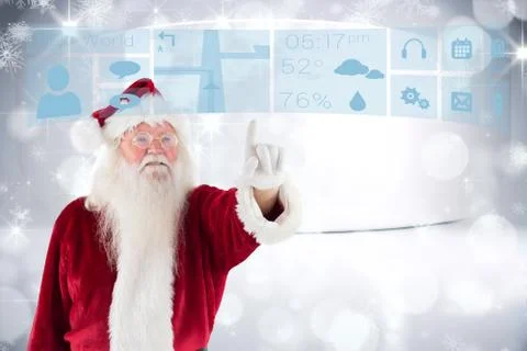 Composite image of santa claus points at something Stock Photos