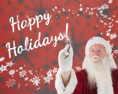 Composite image of santa writes something with a pen 스톡 사진