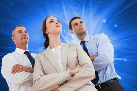 Composite image of serious work team posing together looking away 库存插图